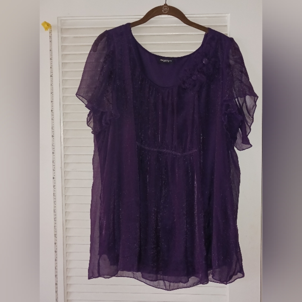 1x purple sheer blouse with shell and flower detail